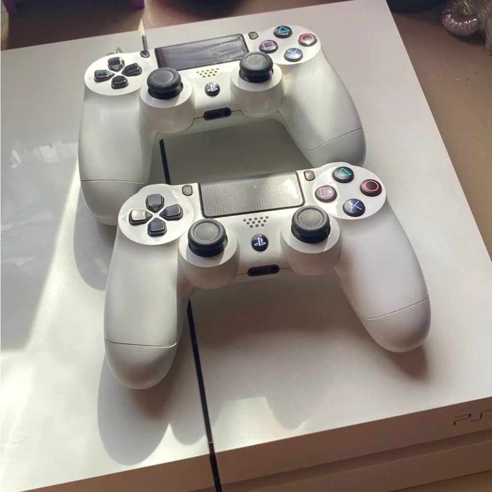 PS4 console with controllers